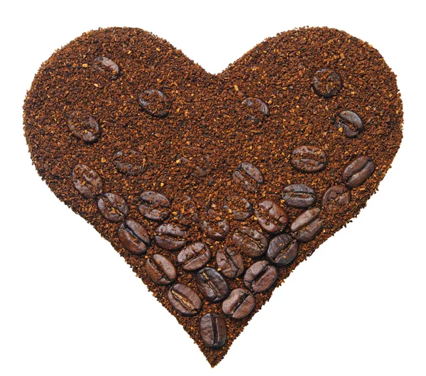 Ground coffee in the shape of heart — Stock Photo, Image