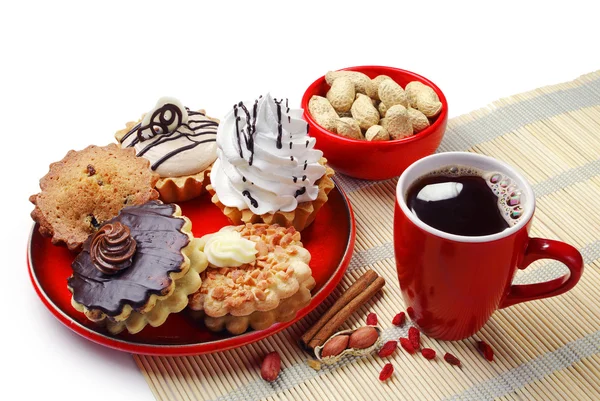 Cakes en kopje koffie — Stockfoto