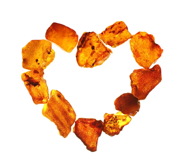 Amber in the shape of a heart — Stock Photo, Image