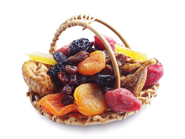Different dried fruits in a basket