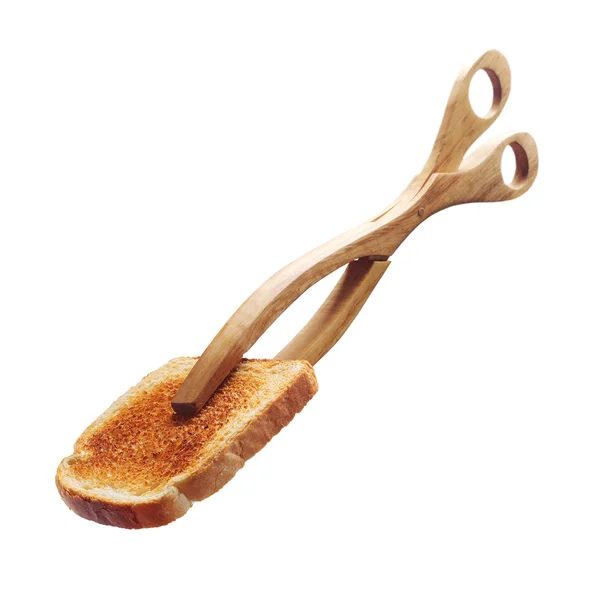 Toast with wooden tongs — Stock Photo, Image