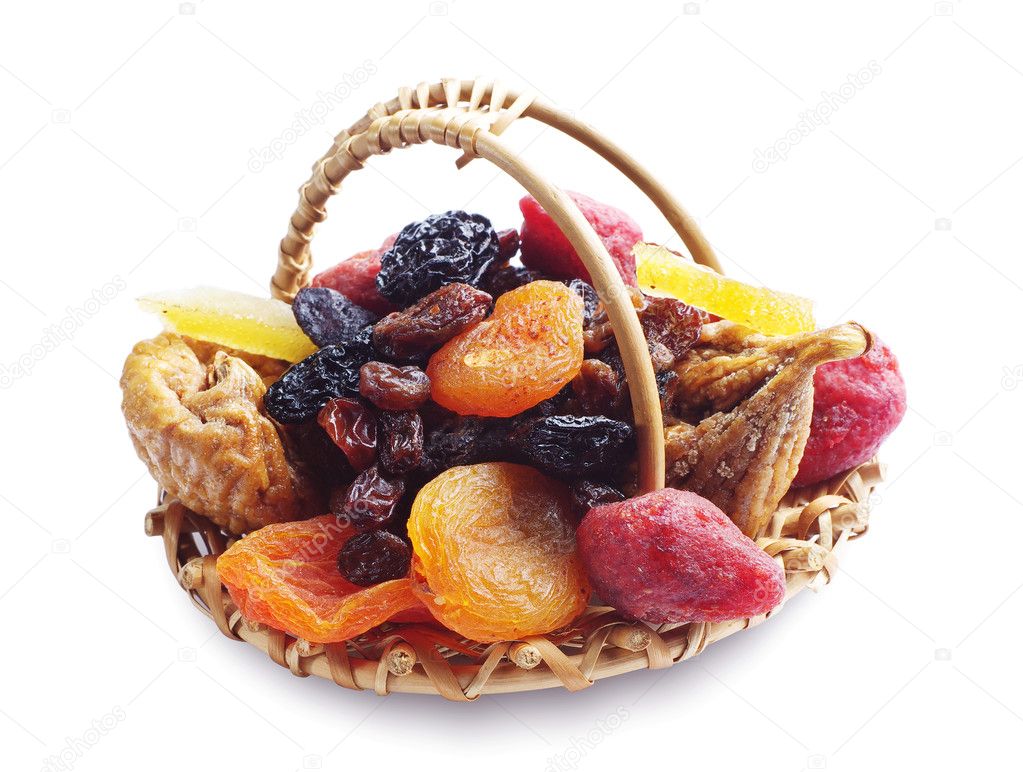 Different dried fruits in a basket Stock Photo by ©Sasajo 33003699