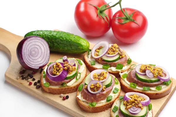 Sandwiches with sausage and onion — Stock Photo, Image