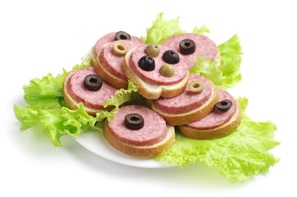 Sandwiches with sausage, lettuce and olives — Stock Photo, Image