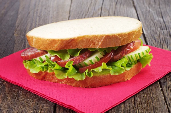 Sandwich with sausage — Stock Photo, Image