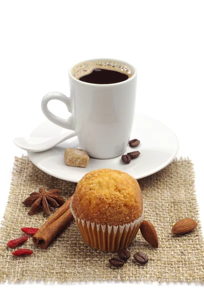 Small cupcake and cup of coffee — Stock Photo, Image