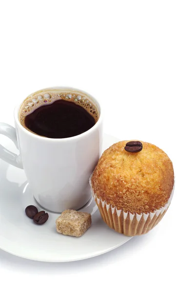 Taza de café y cupcake primer plano —  Fotos de Stock