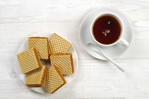 Wafel i filiżankę herbaty — Zdjęcie stockowe