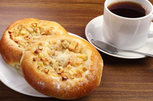 Çörek ve kahve yuvarlak — Stok fotoğraf