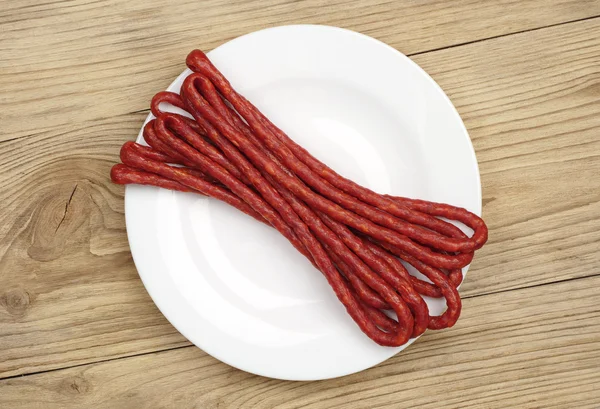 Thin dried sausages — Stock Photo, Image