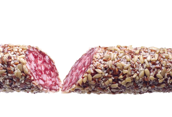 Dois pedaços de salsicha com sementes de girassol — Fotografia de Stock