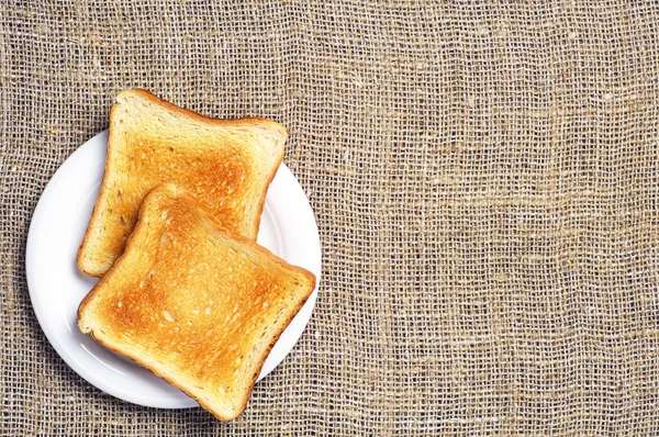 Contexte avec des tranches de pain grillé — Photo