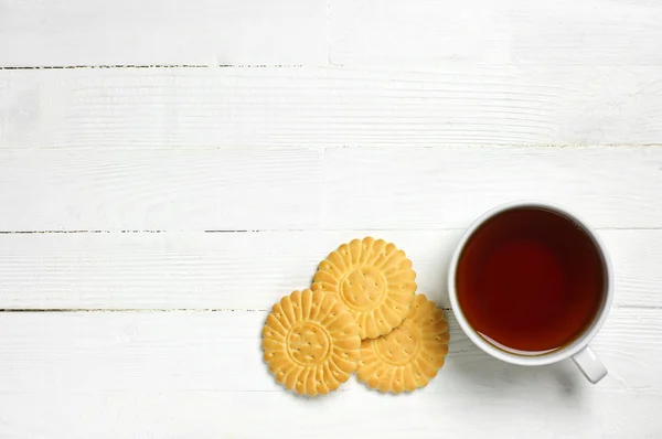 Xícara de chá e biscoitos — Fotografia de Stock