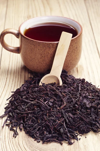 Black tea in a cup — Stock Photo, Image