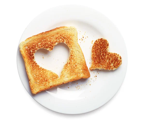 Pan tostado con forma de corazón cortado — Foto de Stock