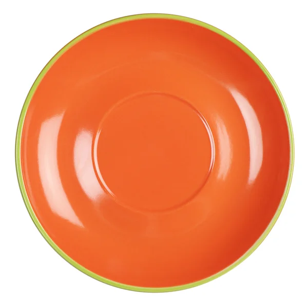 Пустая оранжевая тарелка — стоковое фото