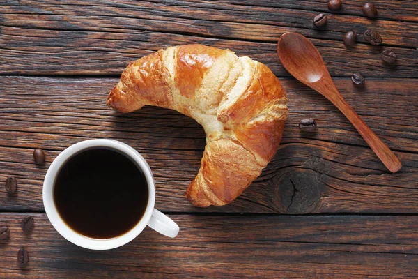 Croissant Recém Assado Xícara Café Mesa Madeira Vista Superior — Fotografia de Stock