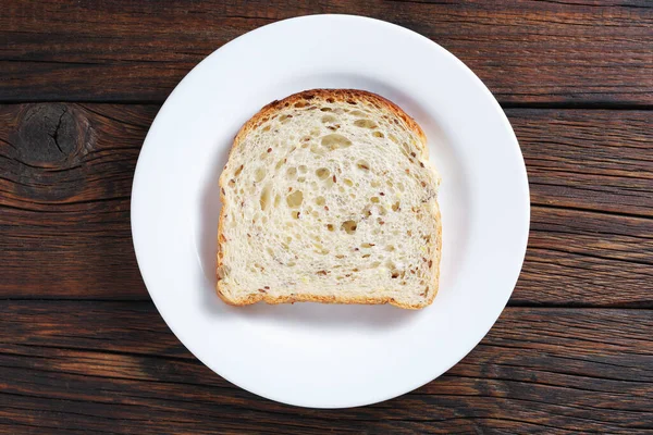 Toast Avec Des Graines Dans Plaque Sur Fond Bois Vue — Photo