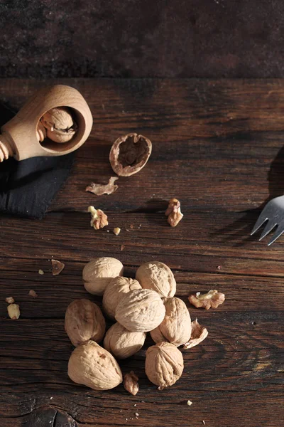Walnuts Nutcracker Dark Wooden Table — Stockfoto