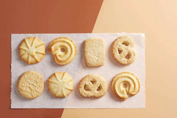 Traditional Butter Cookies Various Shapes Colored Background Top View — стоковое фото