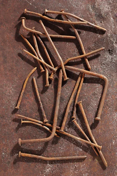 Παλιά Σκουριασμένα Καρφιά Ένα Grunge Φόντο Σιδήρου Πάνω Όψη — Φωτογραφία Αρχείου