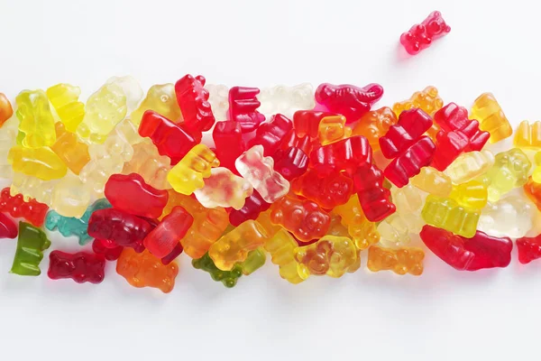 Flerfärgad Gummy Björn Godis Vit Bakgrund Ovanifrån — Stockfoto