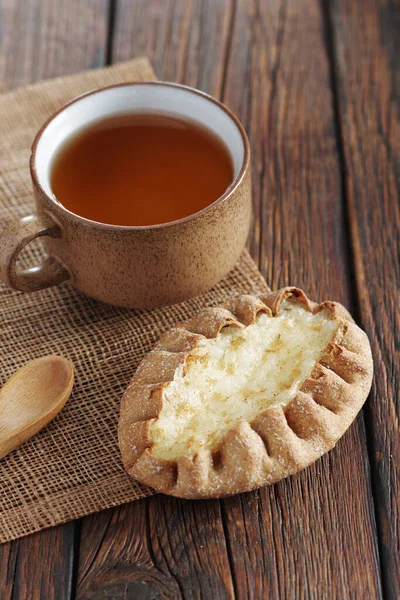 Bun Rice Pudding Cup Tea Rustic Wooden Table — Stock Photo, Image