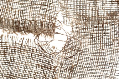 Çuval bezi dokusu beyaz arkaplanda izole edildi, üst görünüm