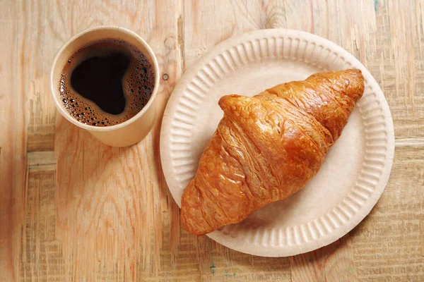 Disposable Cup Coffee Croissant Old Wooden Background — Stock Photo, Image