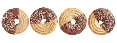 Biscuit cookies with coconut and milk chocolate isolated on white background, top view