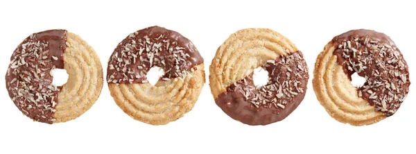 Biscuit cookies with coconut and milk chocolate isolated on white background, top view