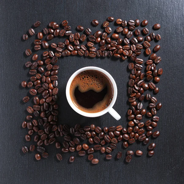 Cup Coffee Roasted Beans Square Shape Black Stone Background Top — Fotografia de Stock