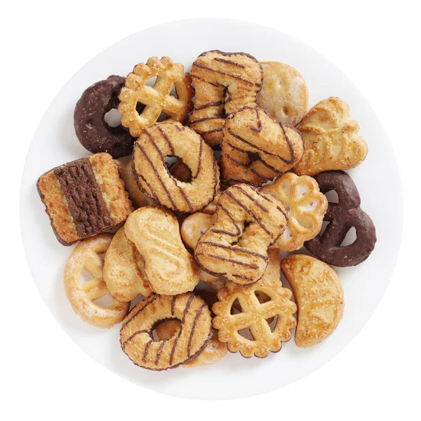 Mix of biscuit cookies on a plate isolated on a white background, top view