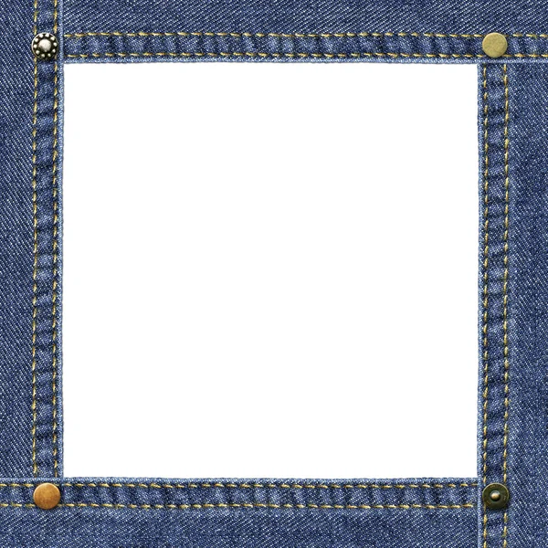 Порожня рамка з блакитного джинсу, прикрашена металевими джинсовими заклепками Ліцензійні Стокові Зображення