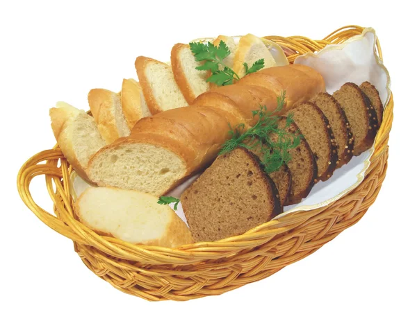 Bröd, råg och vete i en korg. — Stockfoto