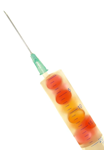 Injectie met gekleurde pillen binnen. — Stockfoto