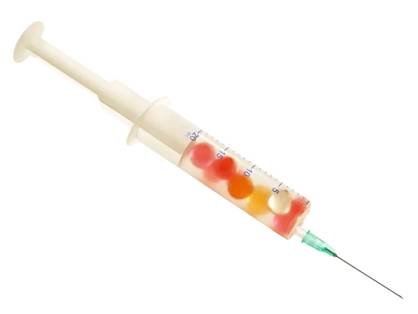 Injectie met gekleurde pillen binnen. — Stockfoto