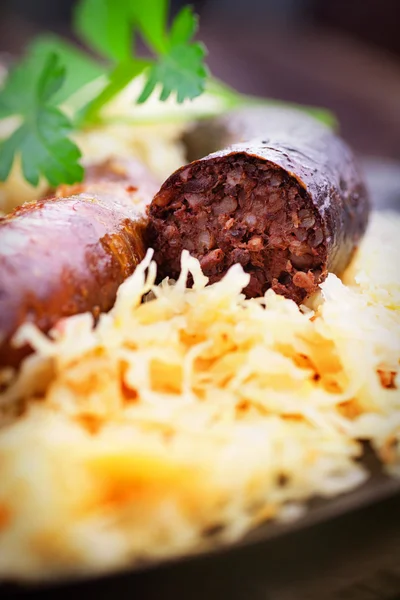 Bloody sausage and sauerkraut — Stock Photo, Image