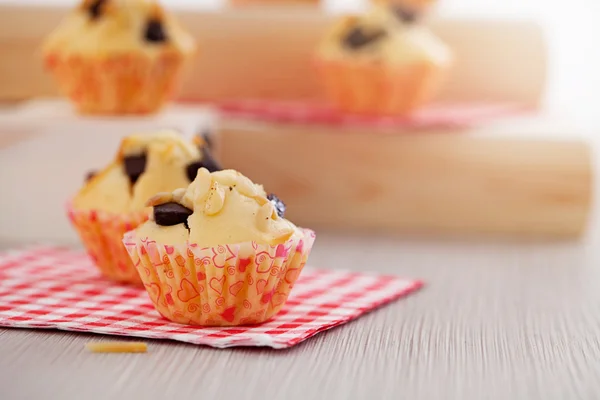 Chocolate chips and almond muffins — Stock Photo, Image