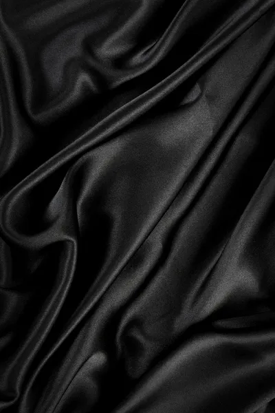 Черный шелк бархатный фон ткани — стоковое фото
