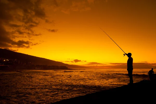 Pescatore al tramonto — Foto Stock