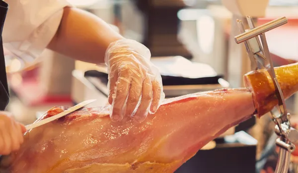 Cutting Curated Ham — Stock Photo, Image