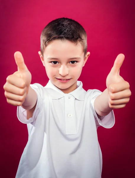 Kleine jongen met Duimschroef opwaarts — Stockfoto