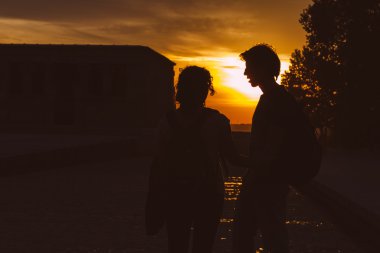 Couple at Sunset in Temple of Debod clipart