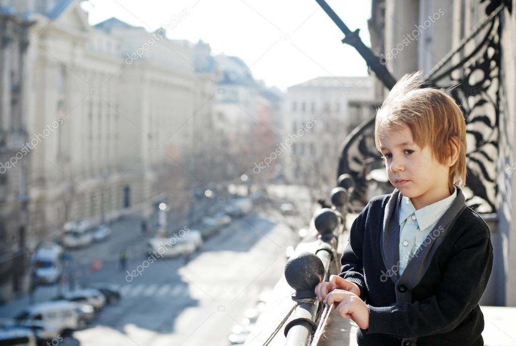 Little boy on the balcony