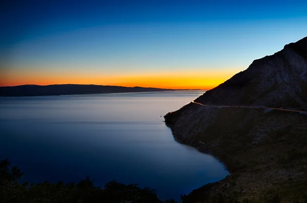 Kleurrijke zonsondergang in de Adriatische Zee, Kroatië — Stockfoto