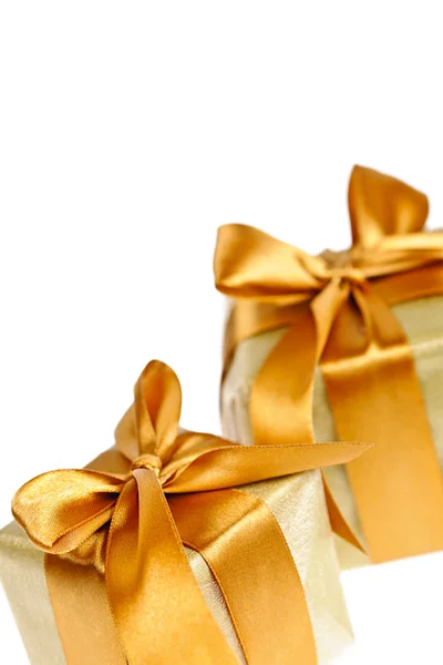 Two golden wrapped gift boxes — Stock Photo, Image