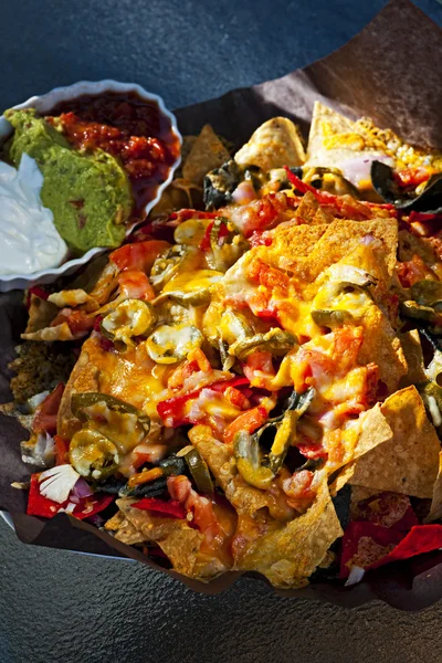 Nacho basket with cheese — Stock Photo, Image