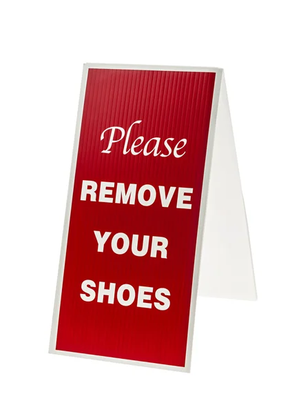 Quítate el signo de zapatos —  Fotos de Stock