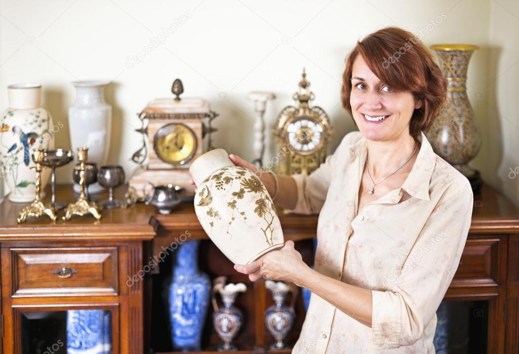 Woman with antique collection